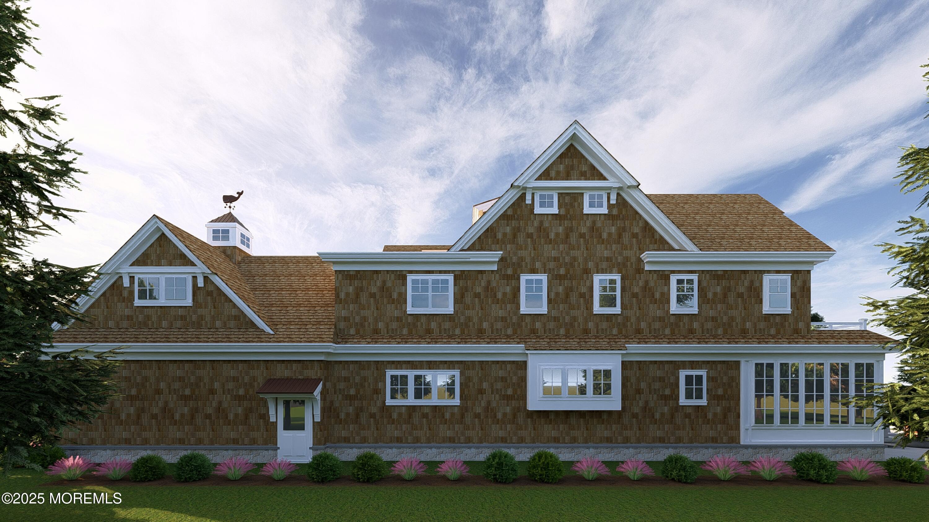 2639 River Road Manasquan, NJ 08736 - Photo 5 of 15 a front view of a house with garden