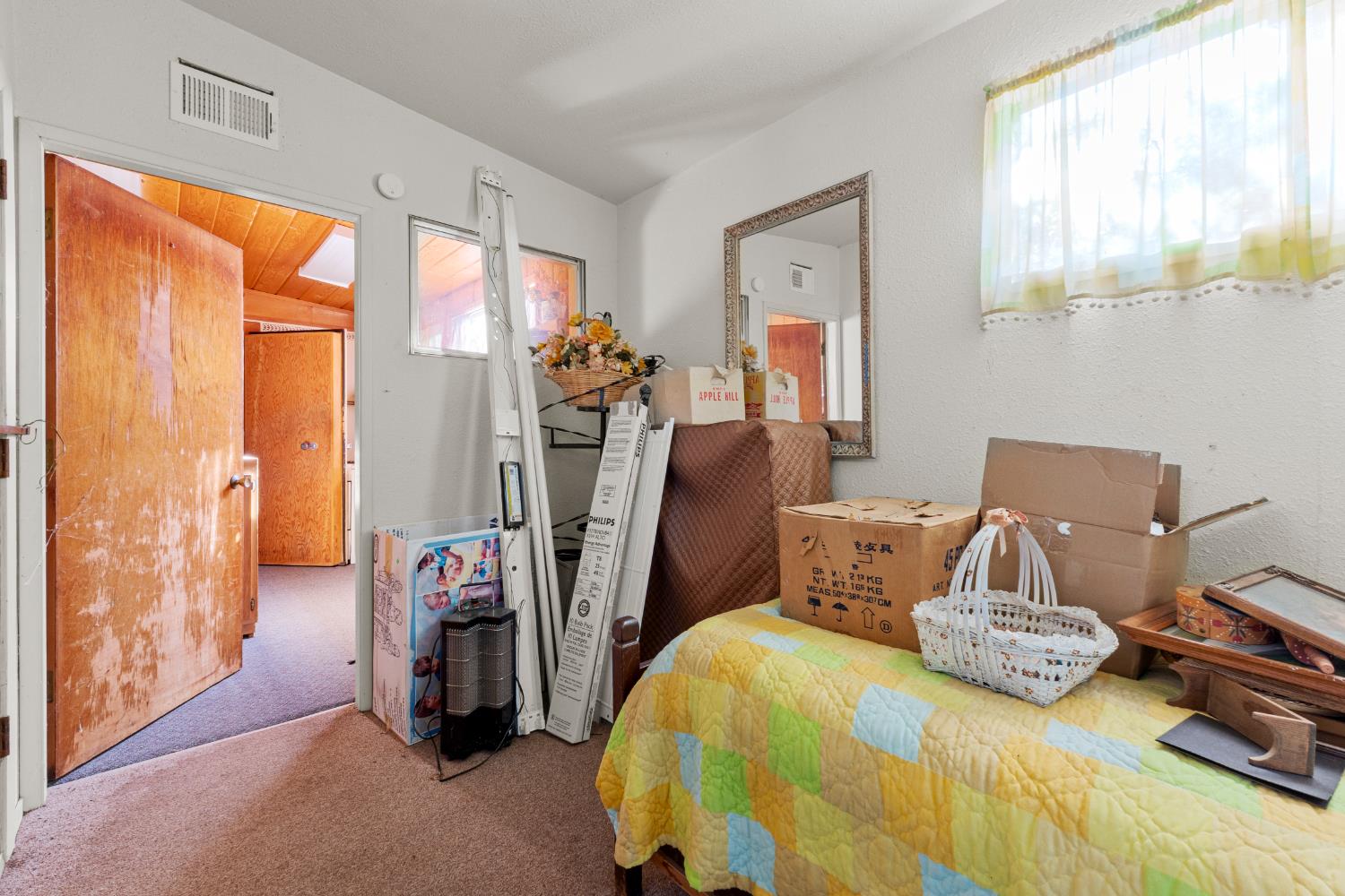 5983 Sly Park Road Placerville, CA 95667 - Photo 16 of 36 a bedroom with a bed and a window