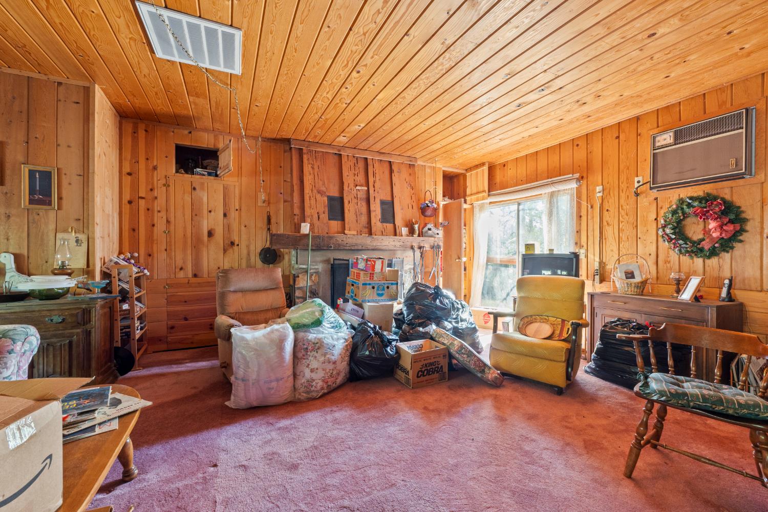 5983 Sly Park Road Placerville, CA 95667 - Photo 22 of 36 a living room with furniture and a large window