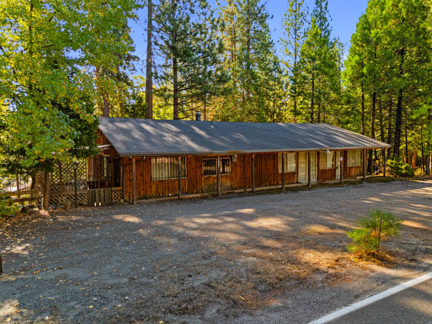 5983 Sly Park Road Placerville, CA 95667 - Photo 3 of 36 a view of a house with a yard