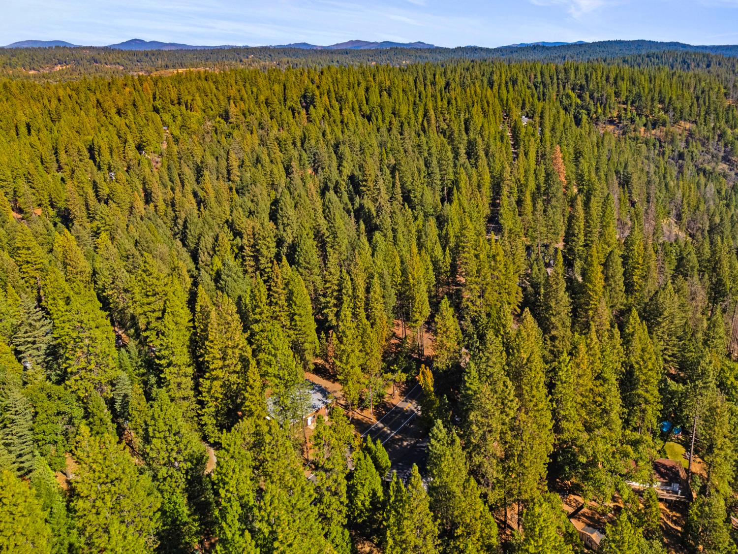 5983 Sly Park Road Placerville, CA 95667 - Photo 31 of 36 a view of a large body of water with a mountain view