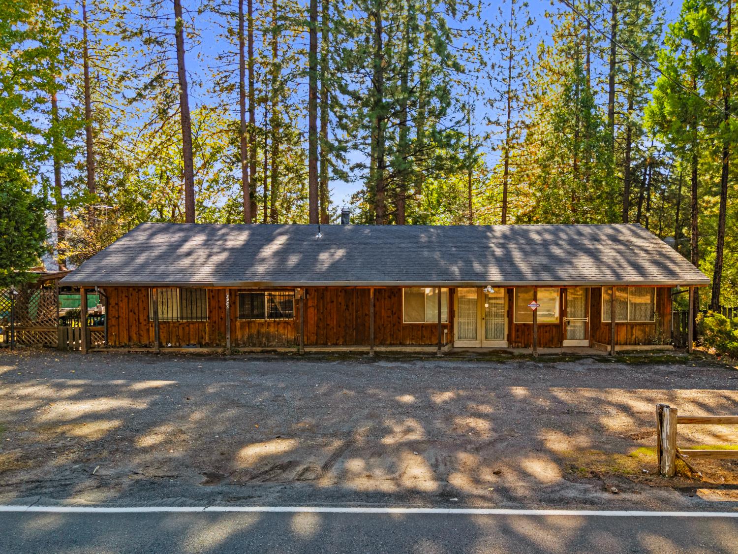5983 Sly Park Road Placerville, CA 95667 - Photo 4 of 36 a view of house with a yard