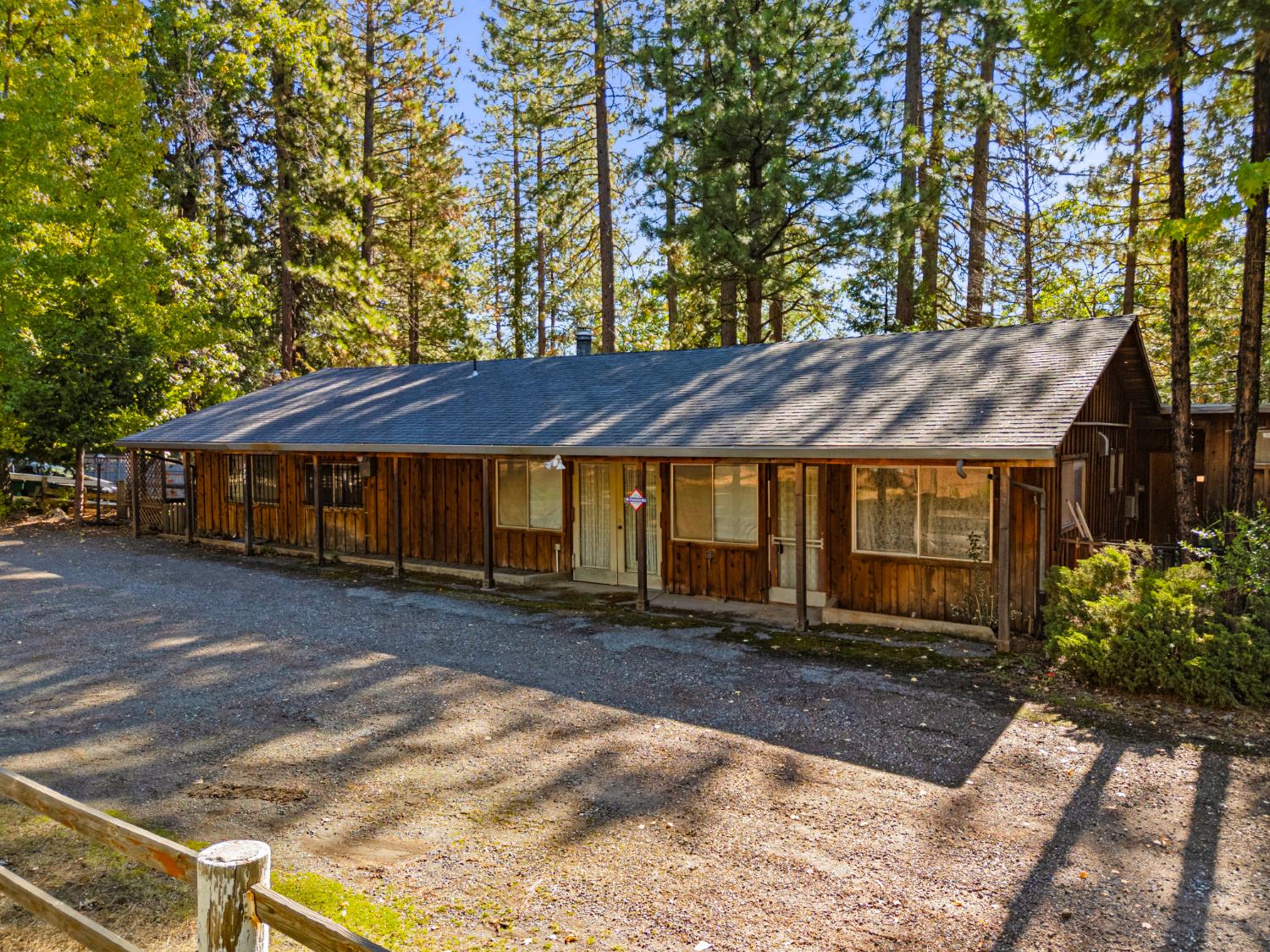 5983 Sly Park Road Placerville, CA 95667 - Photo 5 of 36 a front view of a house with garden