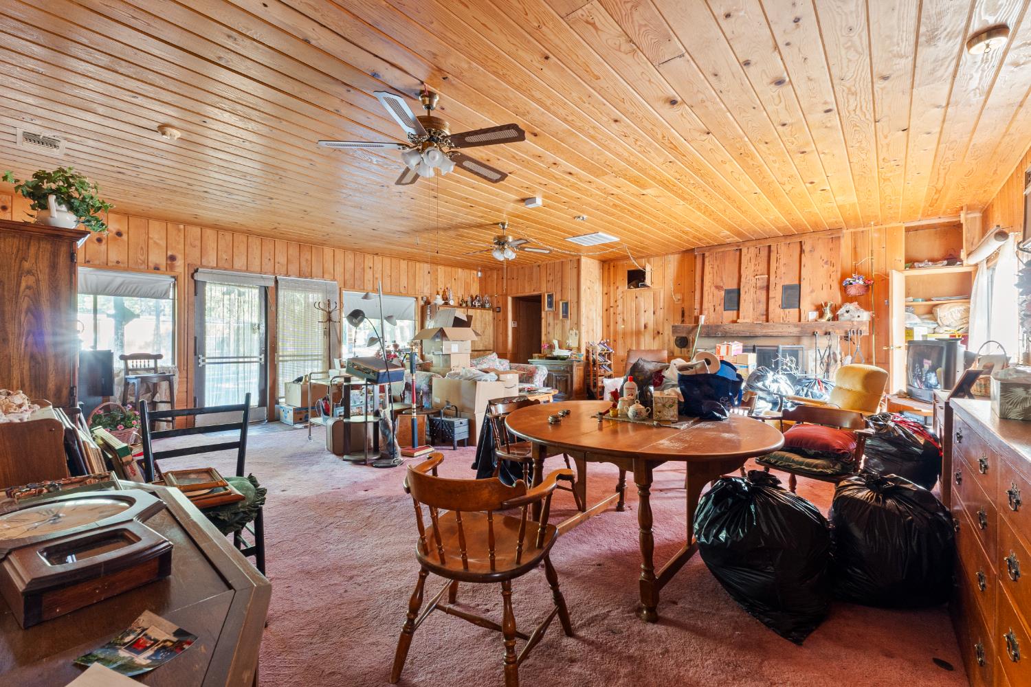 5983 Sly Park Road Placerville, CA 95667 - Photo 10 of 36 a view of a dining room with furniture window and outside view