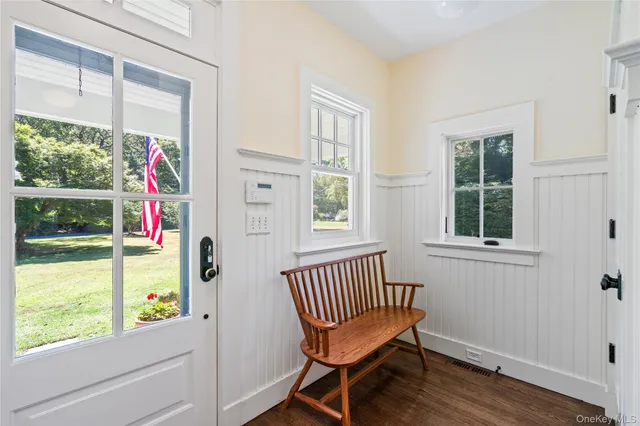 a view of a chair and table in a room