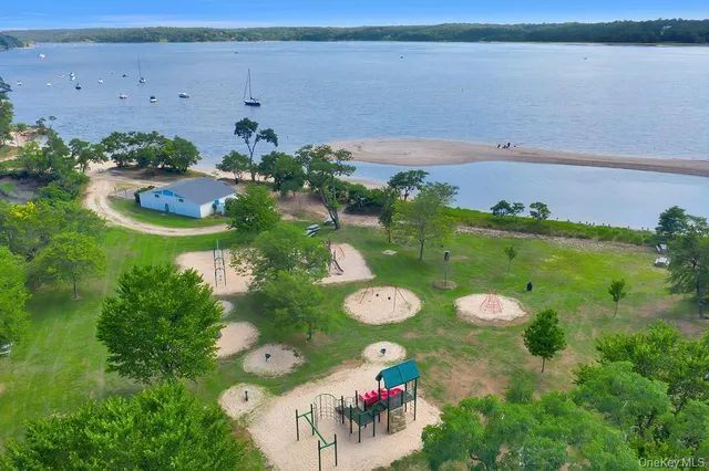 a view of a table and chairs in the garden