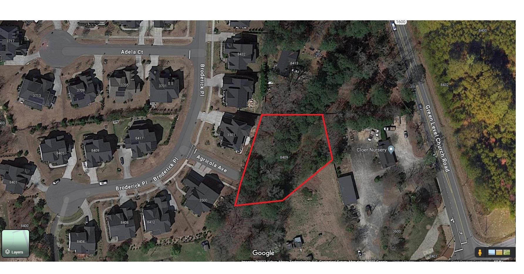 8409 Green Level Church Road Apex, NC 27523 - Photo 3 of 4 a view of a house with a yard