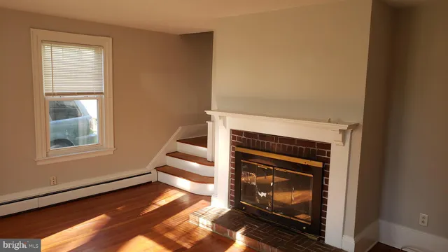 a living room with a fireplace