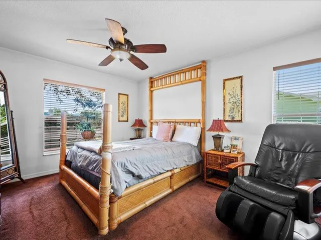 a bed room with a bed and a couch