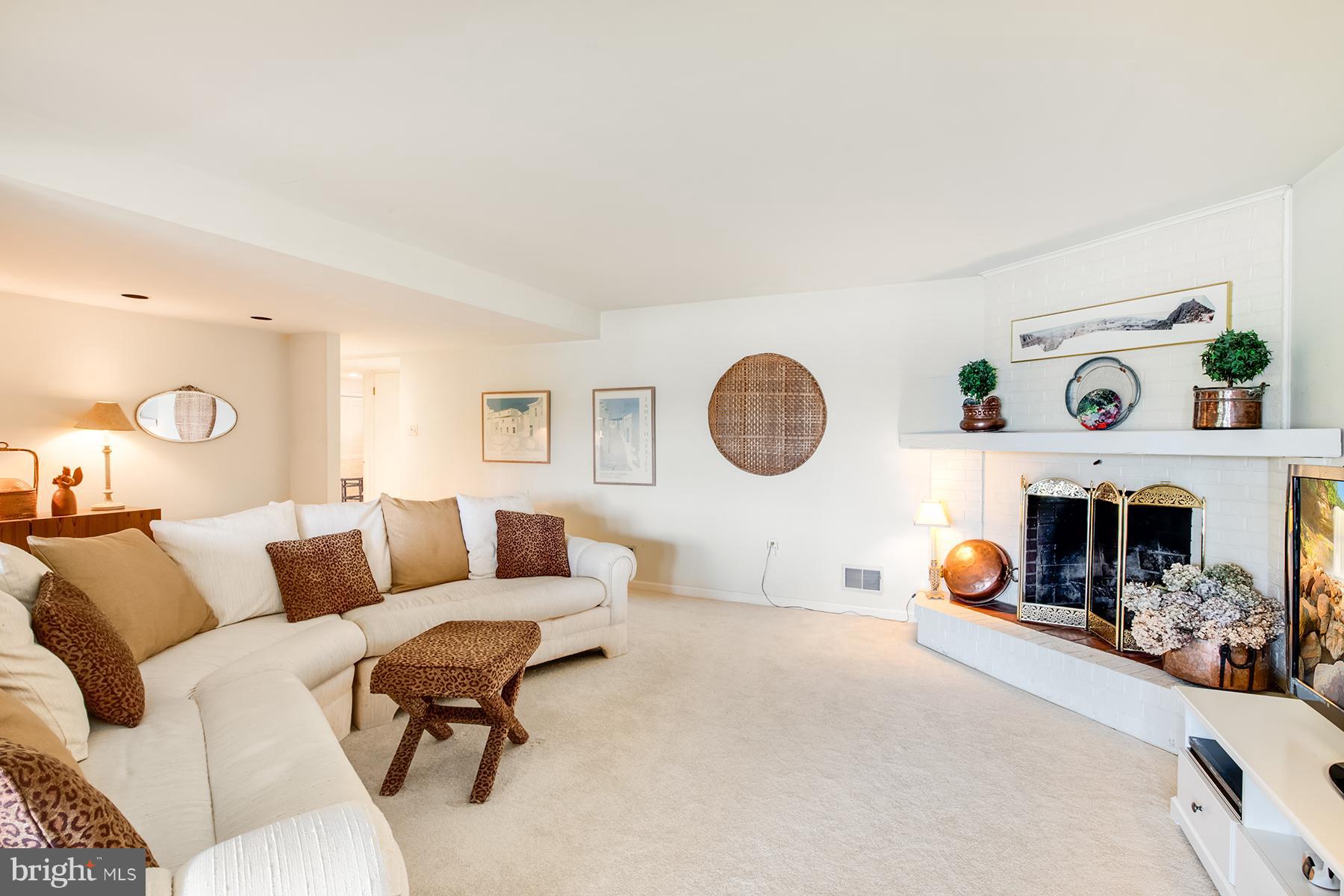 184 Southdown Road Edgewater, MD 21037 - Photo 19 of 30 Family room has a wood-burning fireplace