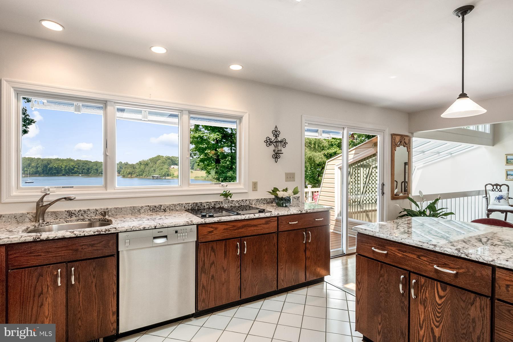184 Southdown Road Edgewater, MD 21037 - Photo 4 of 30 Kitchen has ceramic tile floors + granite counters