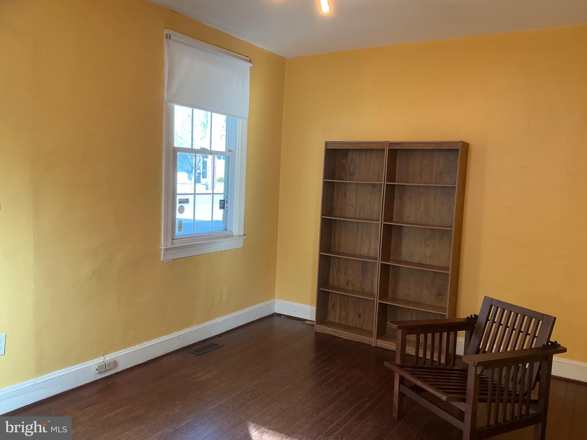 910 Montgomery Street, Unit A Laurel, MD 20707 - Photo 4 of 15 a view of staircase with wooden floor and a window