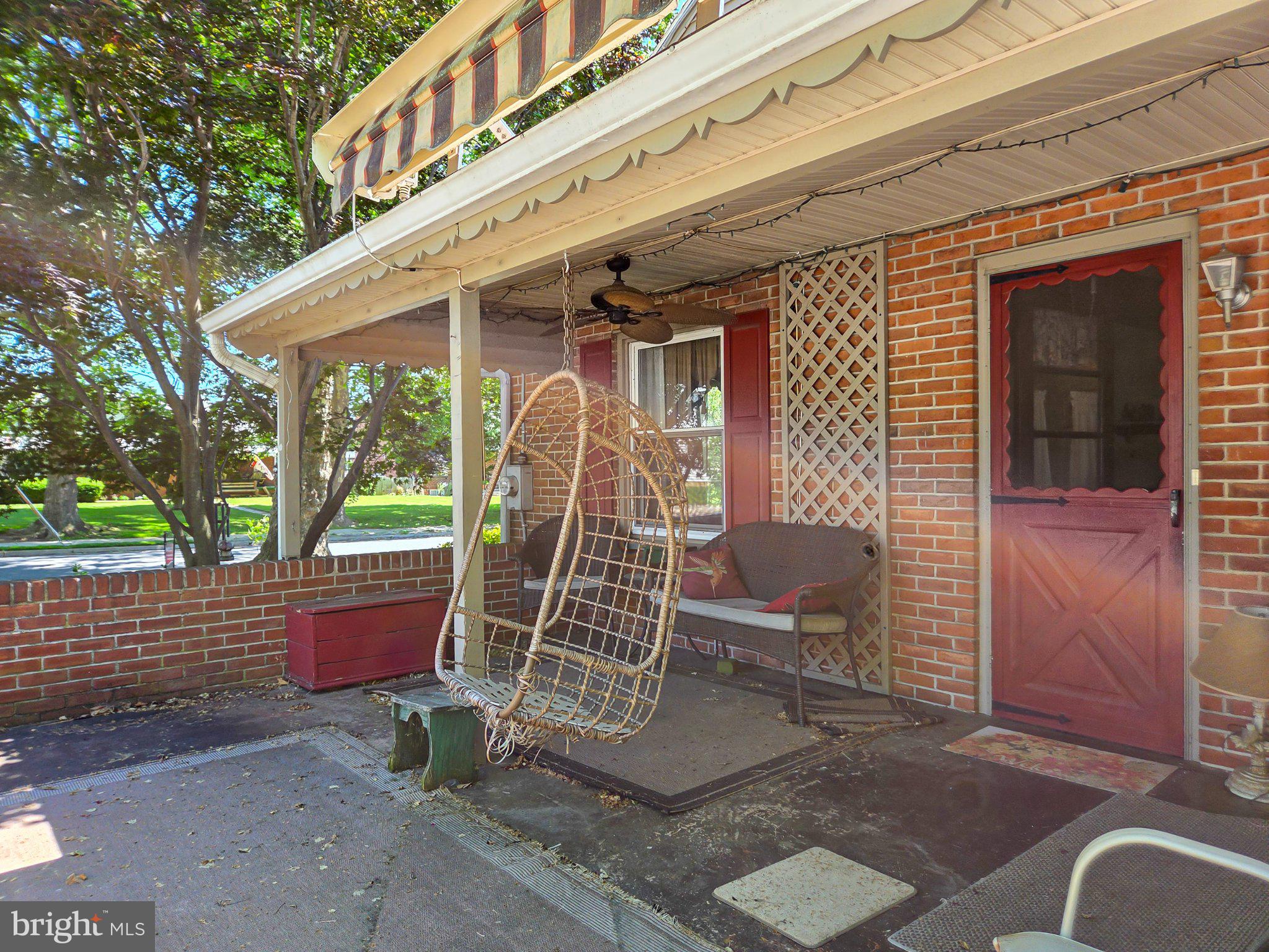 524 Locust Street Denver, PA 17517 - Photo 5 of 36 Charming porch with a cozy swing.