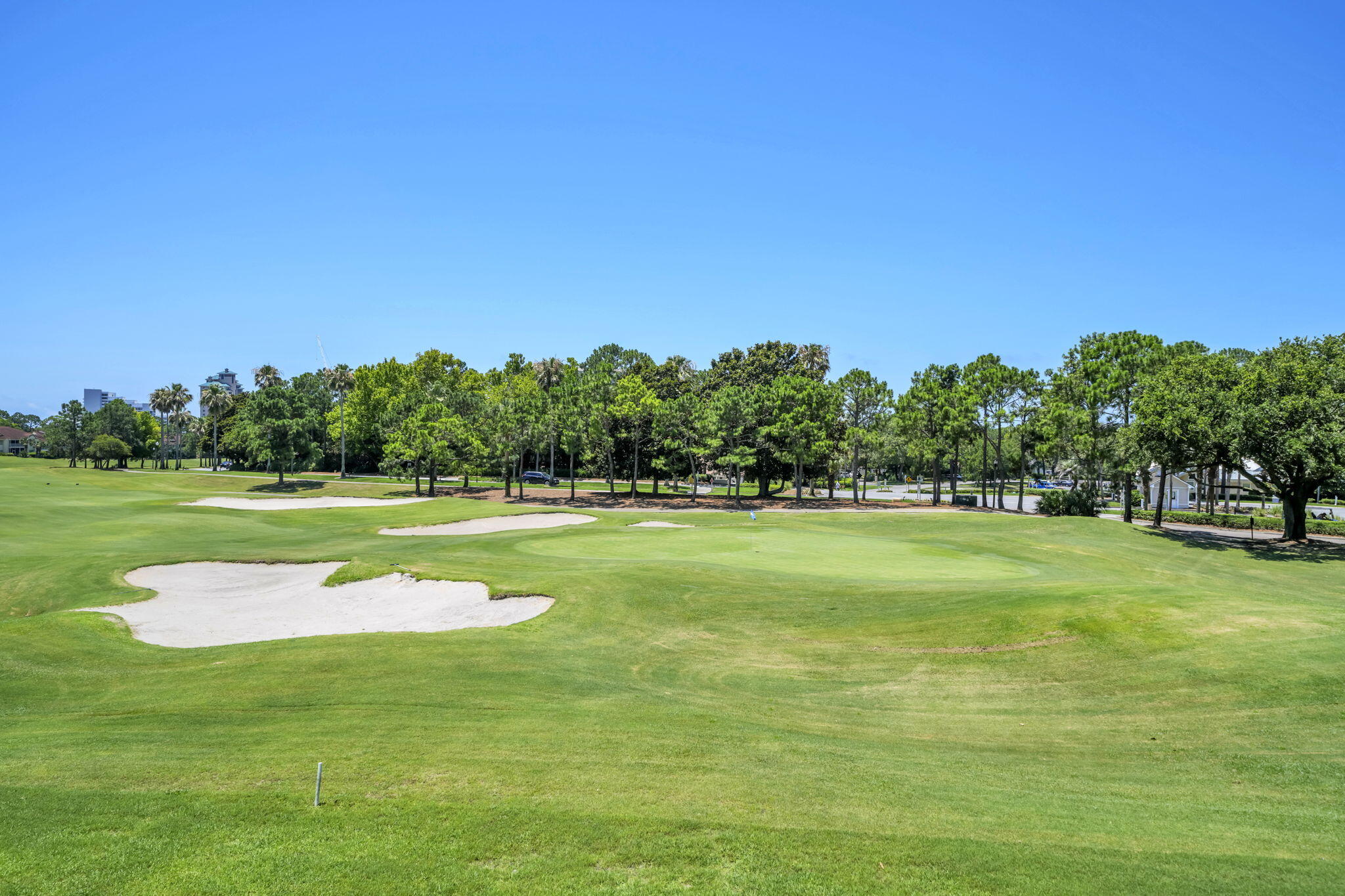 5360 Pine Ridge Lane, Unit 5360 Miramar Beach, FL 32550 - Photo 37 of 44 a view of a golf course with a lake