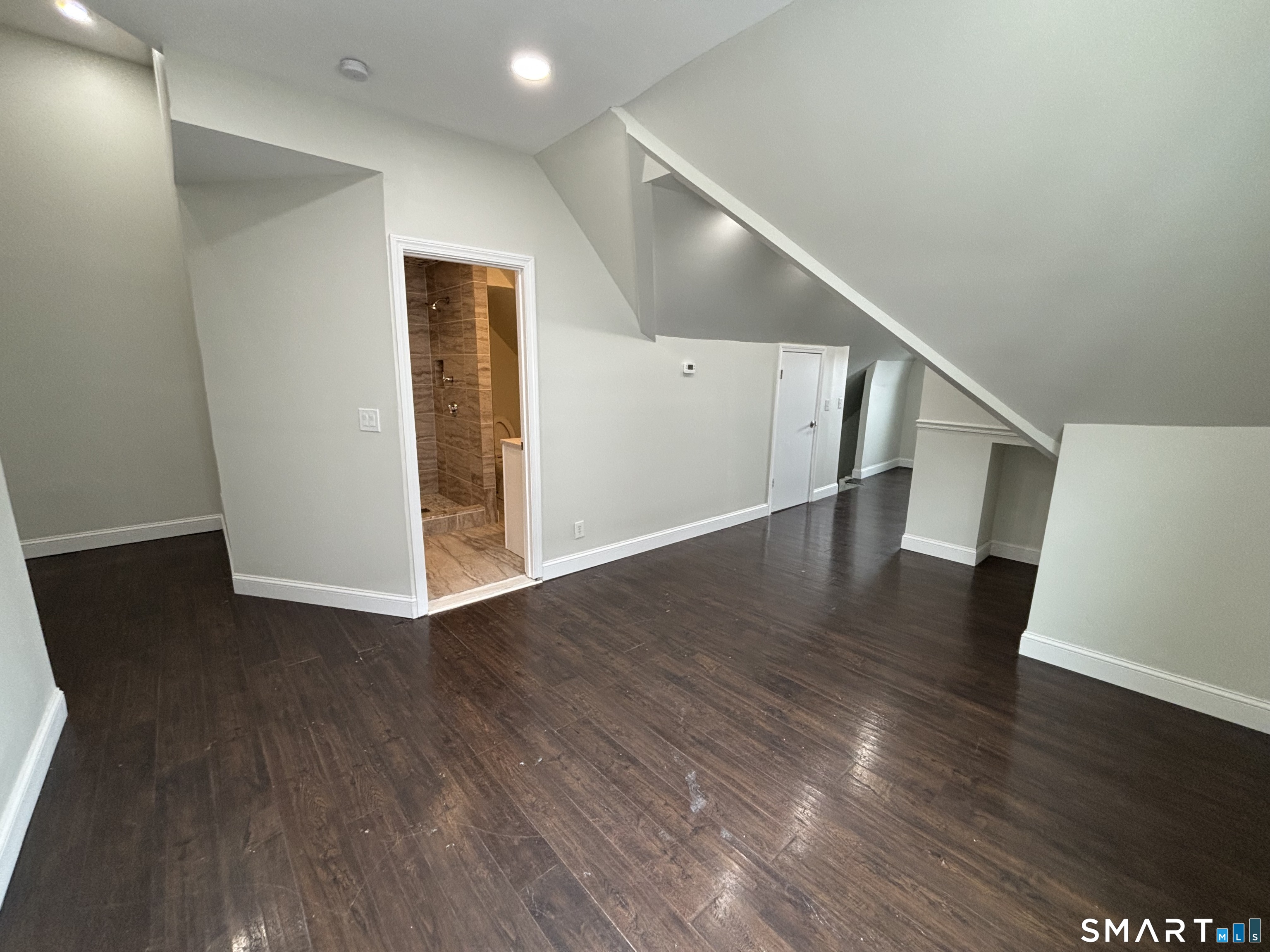 241 Lewis Street Bridgeport, CT 06605 - Photo 29 of 33 a view of entryway with wooden floor