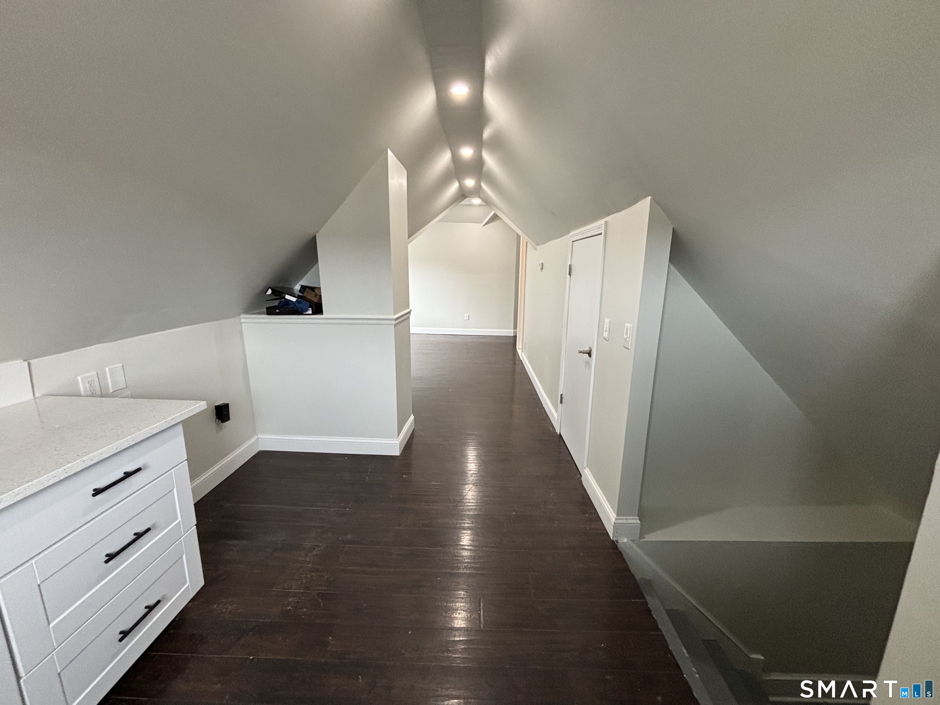 241 Lewis Street Bridgeport, CT 06605 - Photo 33 of 33 a view of a hallway with entryway and stairs