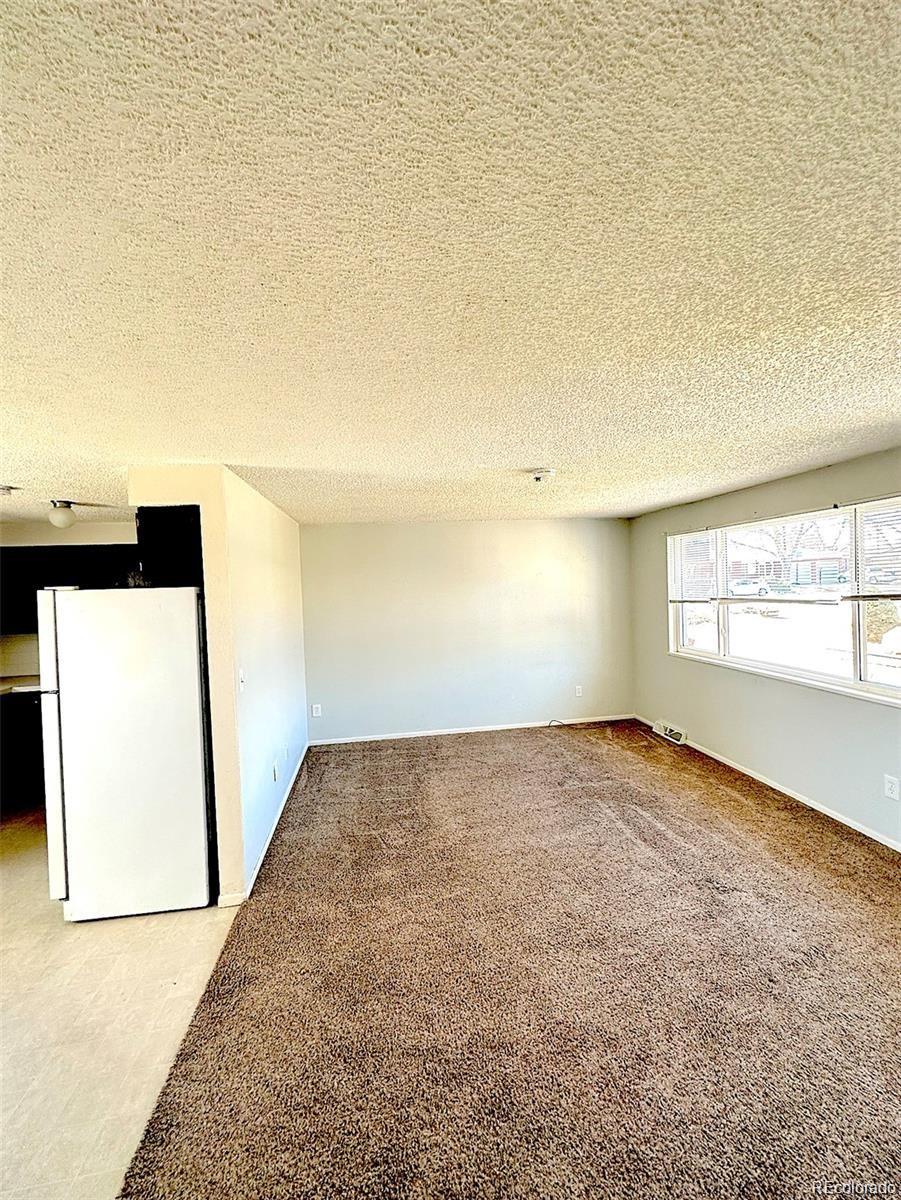 1405 East 16th Street, Unit B Loveland, CO 80538 - Photo 4 of 14 a view of an empty room