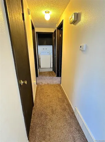 a view of hallway with stairs