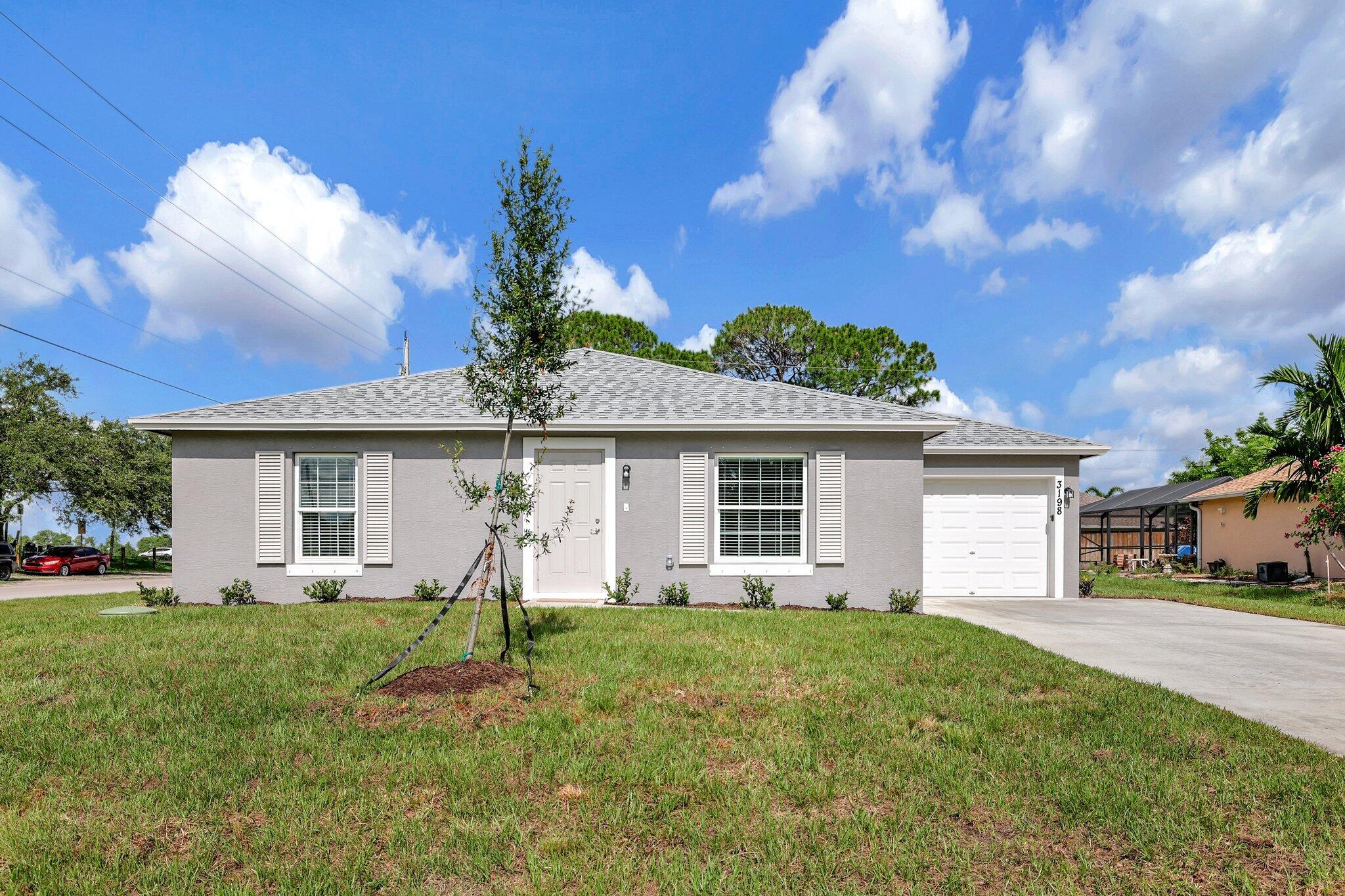 329 Southwest Ridgecrest Drive Port St. Lucie, FL 34953 - Photo 3 of 30 14-web-or-mls-632A5420