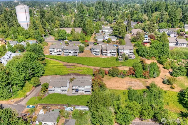 an aerial view of a house with a garden