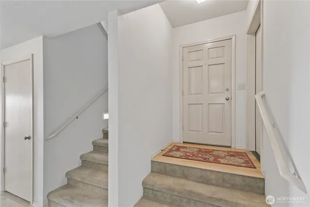 a view of an entryway with staircase