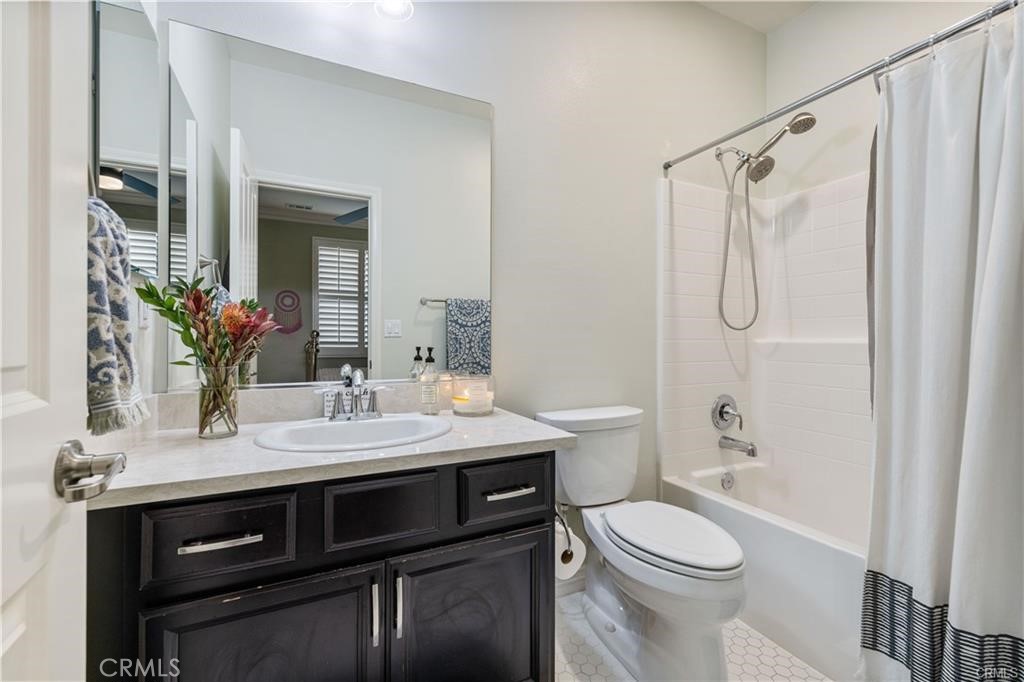 28537 Vista Del Rio Drive Valencia, CA 91354 - Photo 14 of 31 a bathroom with a sink a toilet and shower