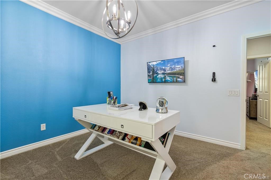 28537 Vista Del Rio Drive Valencia, CA 91354 - Photo 17 of 31 a view of a room with furniture and chandelier