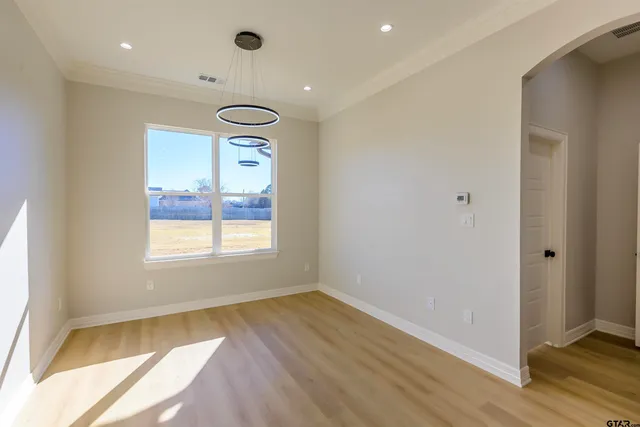 a bed room with a bed and dresser