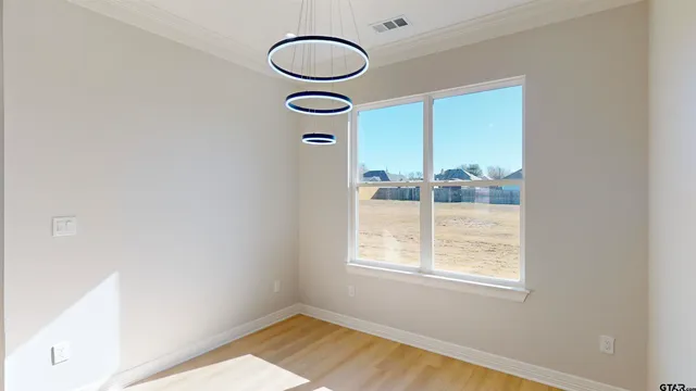 a bathroom with a double vanity sink mirror and bathtub