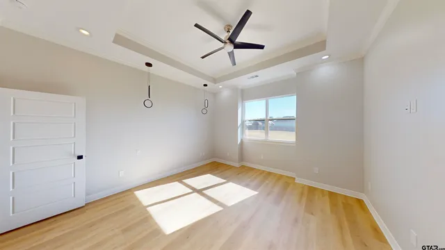 a bathroom with a double vanity sink mirror and toilet
