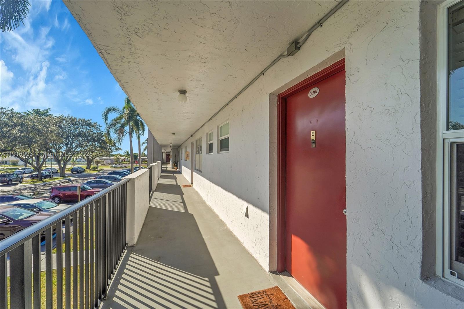 8405 Northwest 61st Street, Unit D207 Tamarac, FL 33321 - Photo 14 of 28 a view of a balcony
