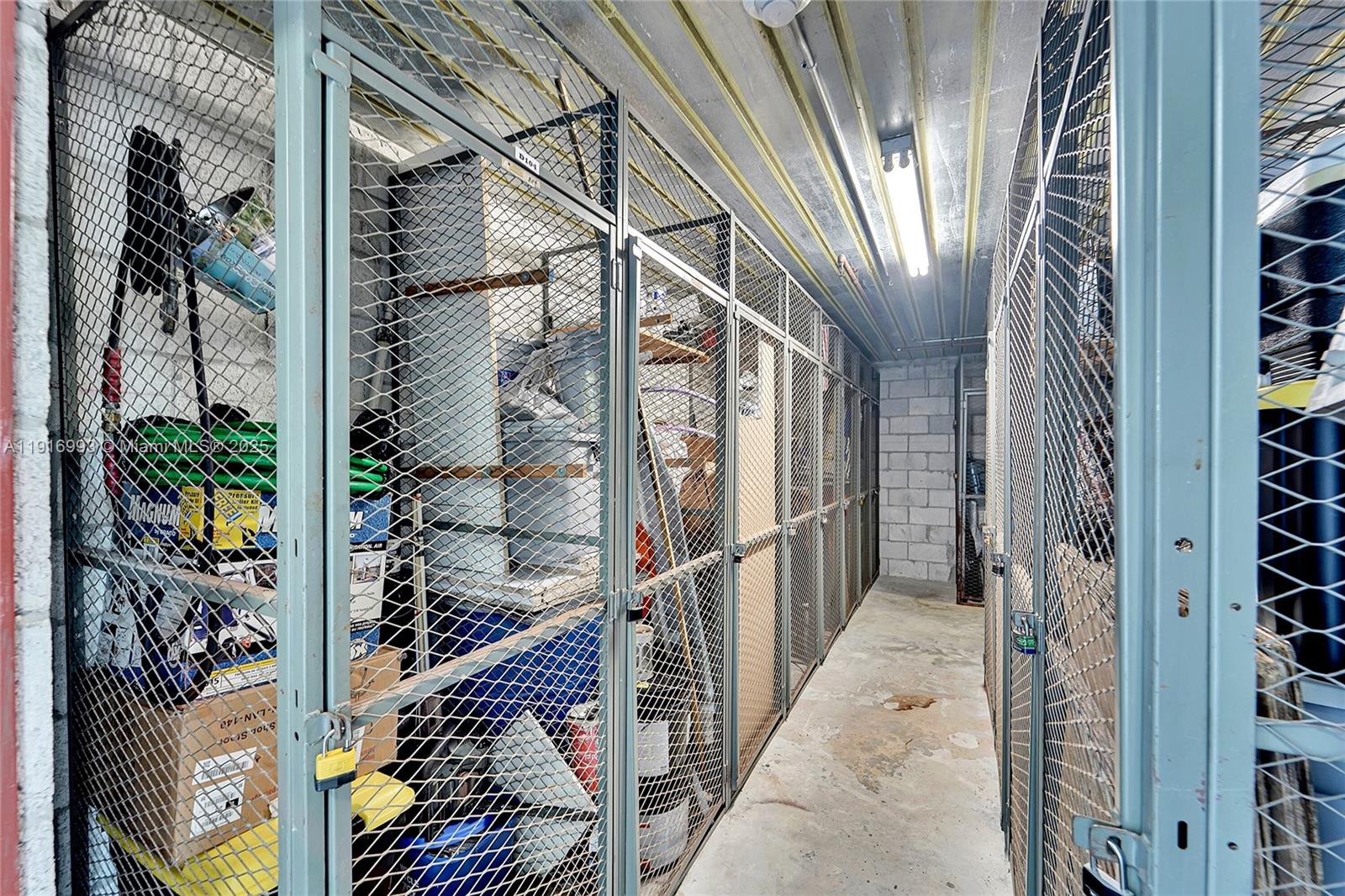 8405 Northwest 61st Street, Unit D207 Tamarac, FL 33321 - Photo 15 of 28 a view of a hallway with wooden floor and door