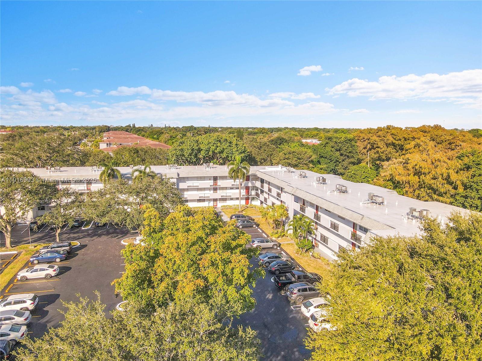 8405 Northwest 61st Street, Unit D207 Tamarac, FL 33321 - Photo 23 of 28 a view of a city with an ocean view