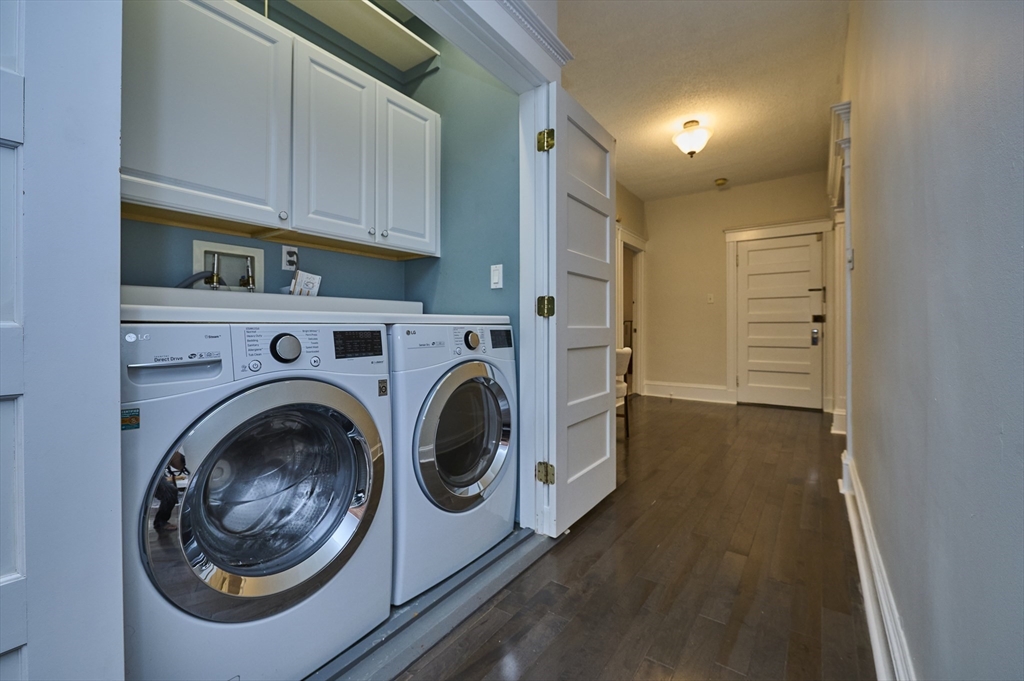 5 Auburn Court, Unit 1 Brookline, MA 02446 - Photo 20 of 22 a utility room with dryer and washer