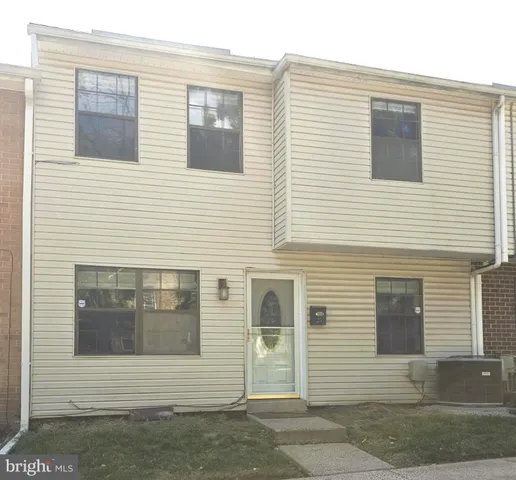 a view of a house with white door
