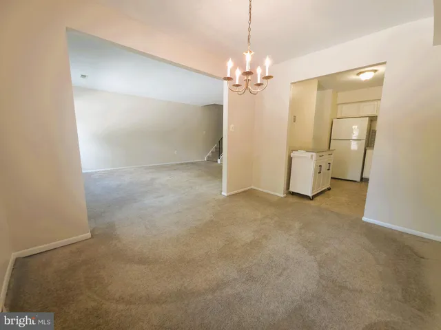 a view of a livingroom with a chandelier