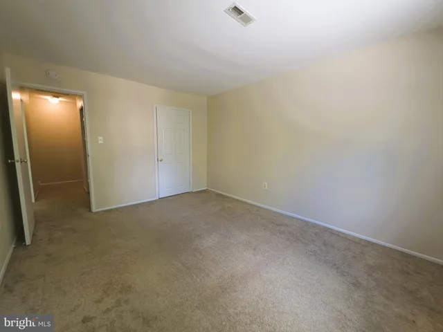 a view of an empty room and a gallery