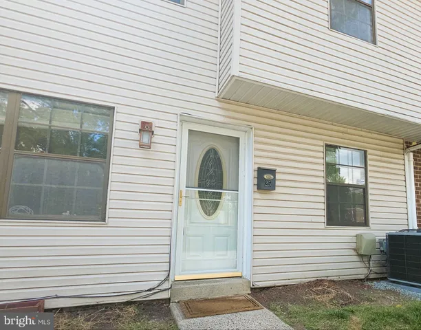 a view of a house with white door