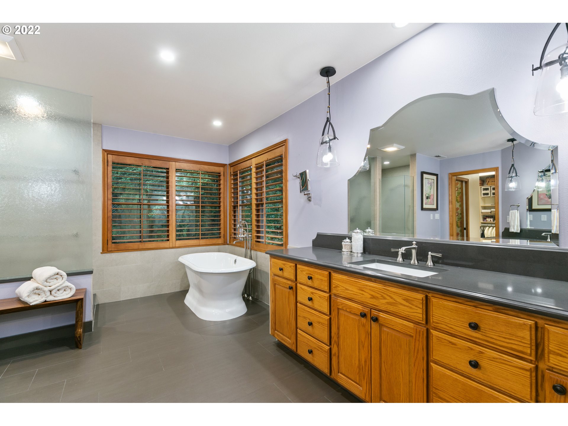 13890 South Carus Road Oregon City, OR 97045 - Photo 14 of 31 a bathroom with a toilet sink and mirror