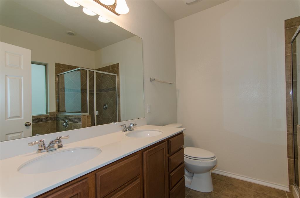 1044 Clove Hitch Road Georgetown, TX 78633 - Photo 12 of 19 a bathroom with a sink and a mirror