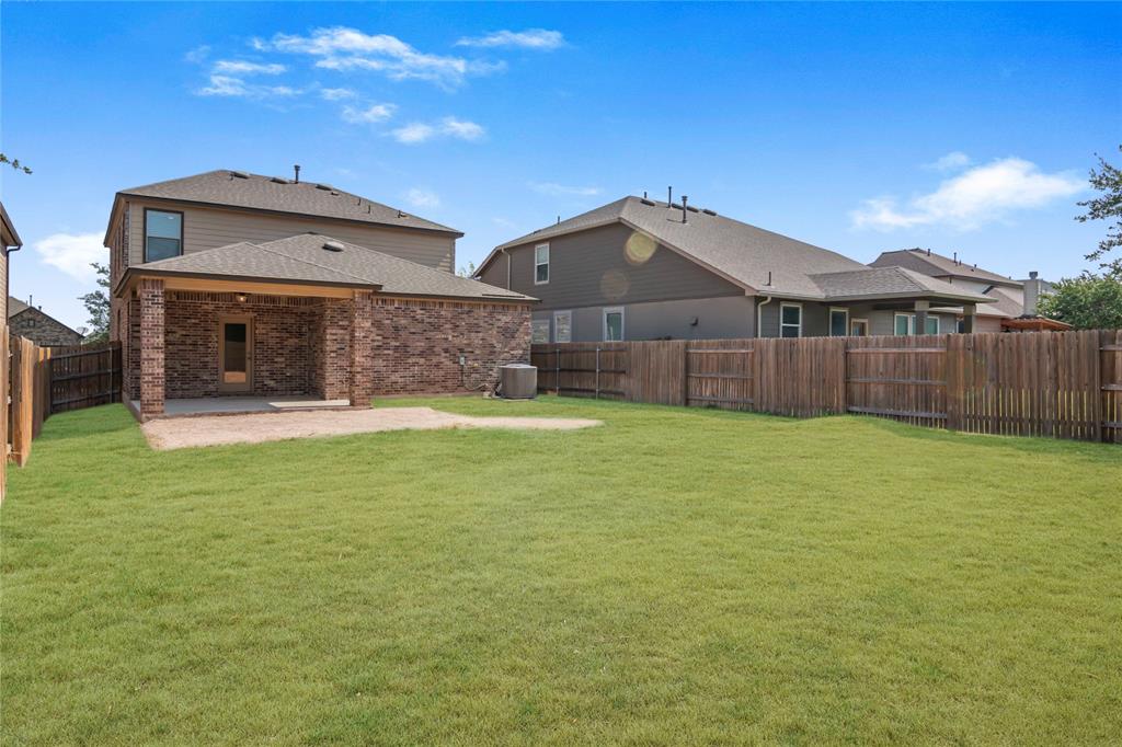 1044 Clove Hitch Road Georgetown, TX 78633 - Photo 18 of 19 a view of a house with a yard