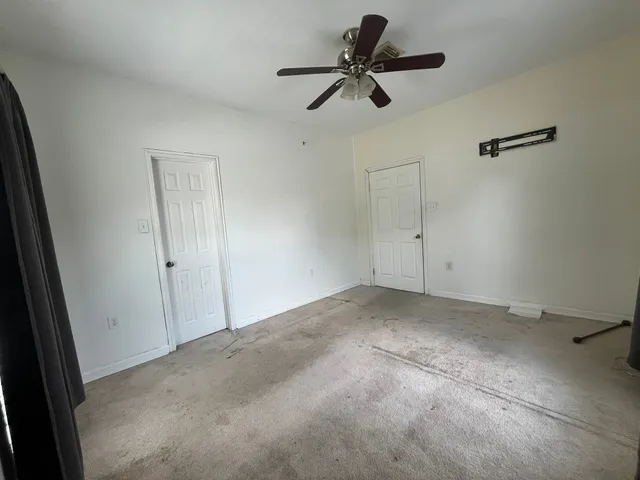 a view of yard with patio