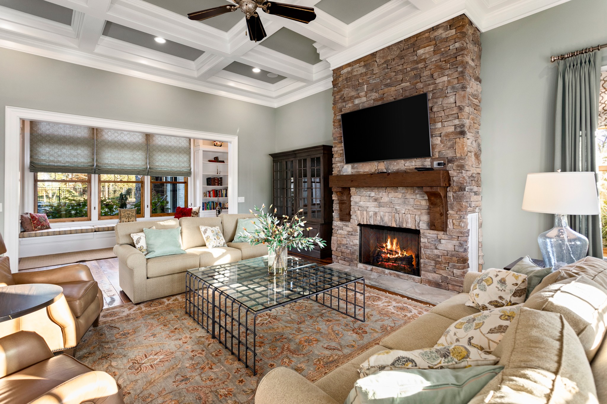 11137 Threet Road Christiana, TN 37037 - Photo 9 of 49 a living room with furniture a flat screen tv and a fireplace