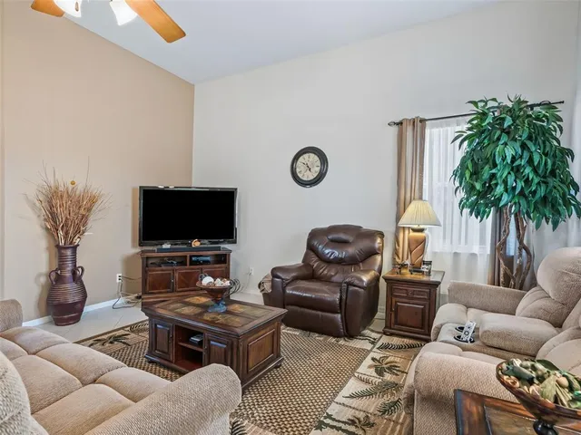 a kitchen with stainless steel appliances granite countertop a refrigerator and a stove