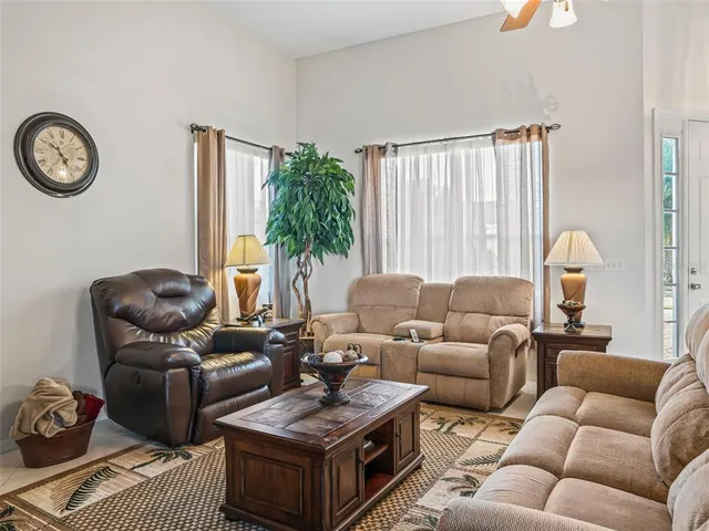 a en suite bathroom with double vanity sinks a mirror and a bathtub