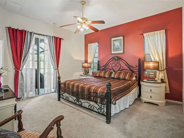 a view of a white house with a sink and yard