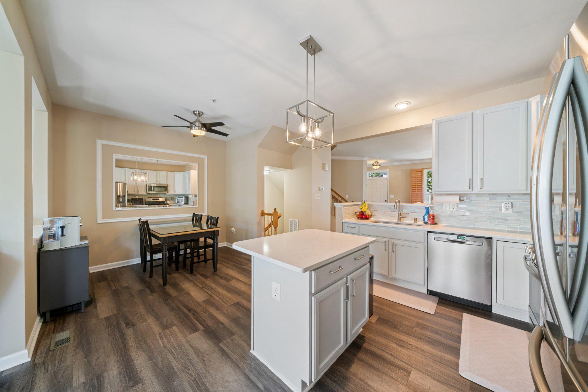 13916 Lullaby Road Germantown, MD 20874 - Photo 8 of 45 Kitchen and dining area on main level.