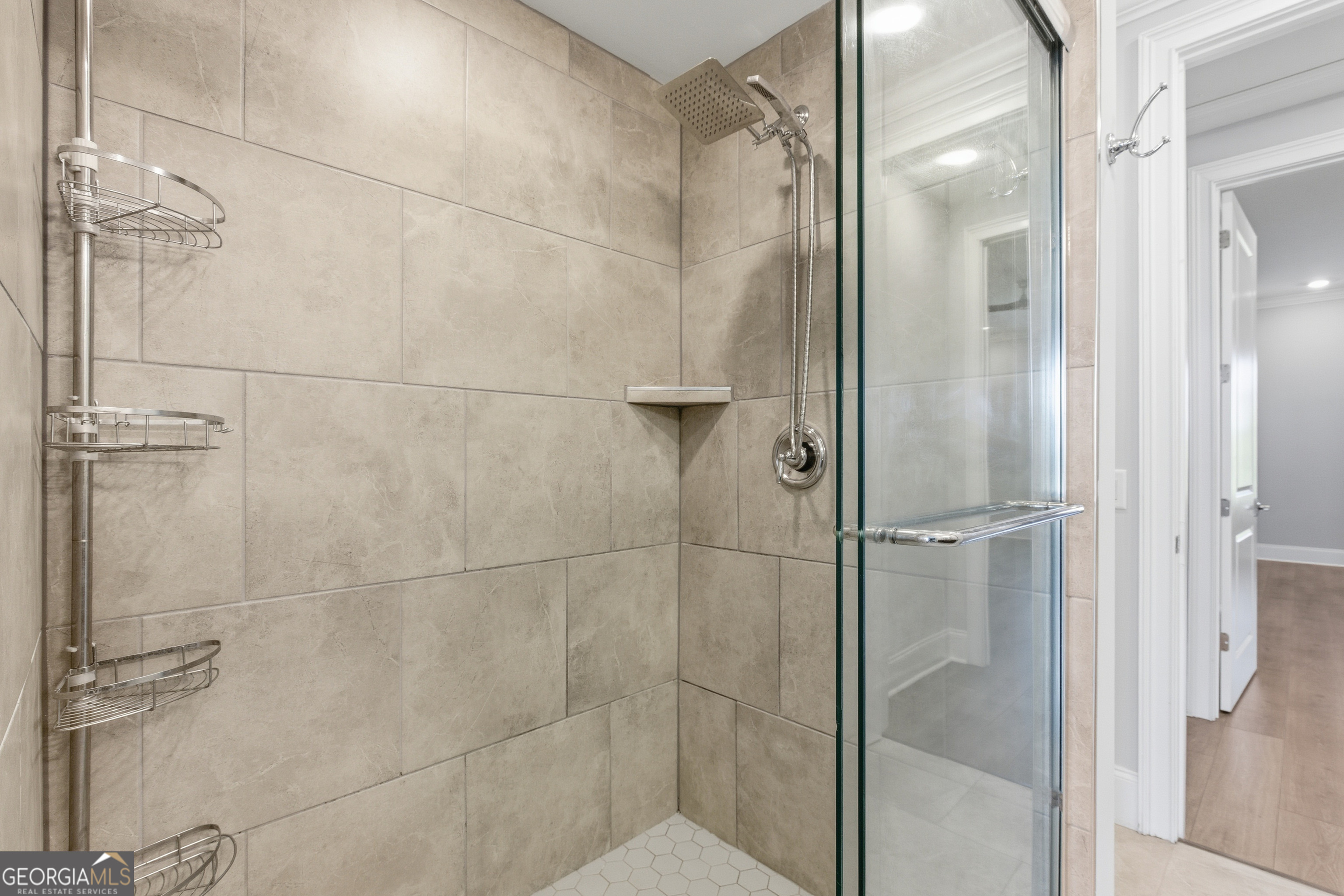 17 Cottage Lane, Unit 202 Toccoa, GA 30577 - Photo 19 of 43 a bathroom with a glass shower door