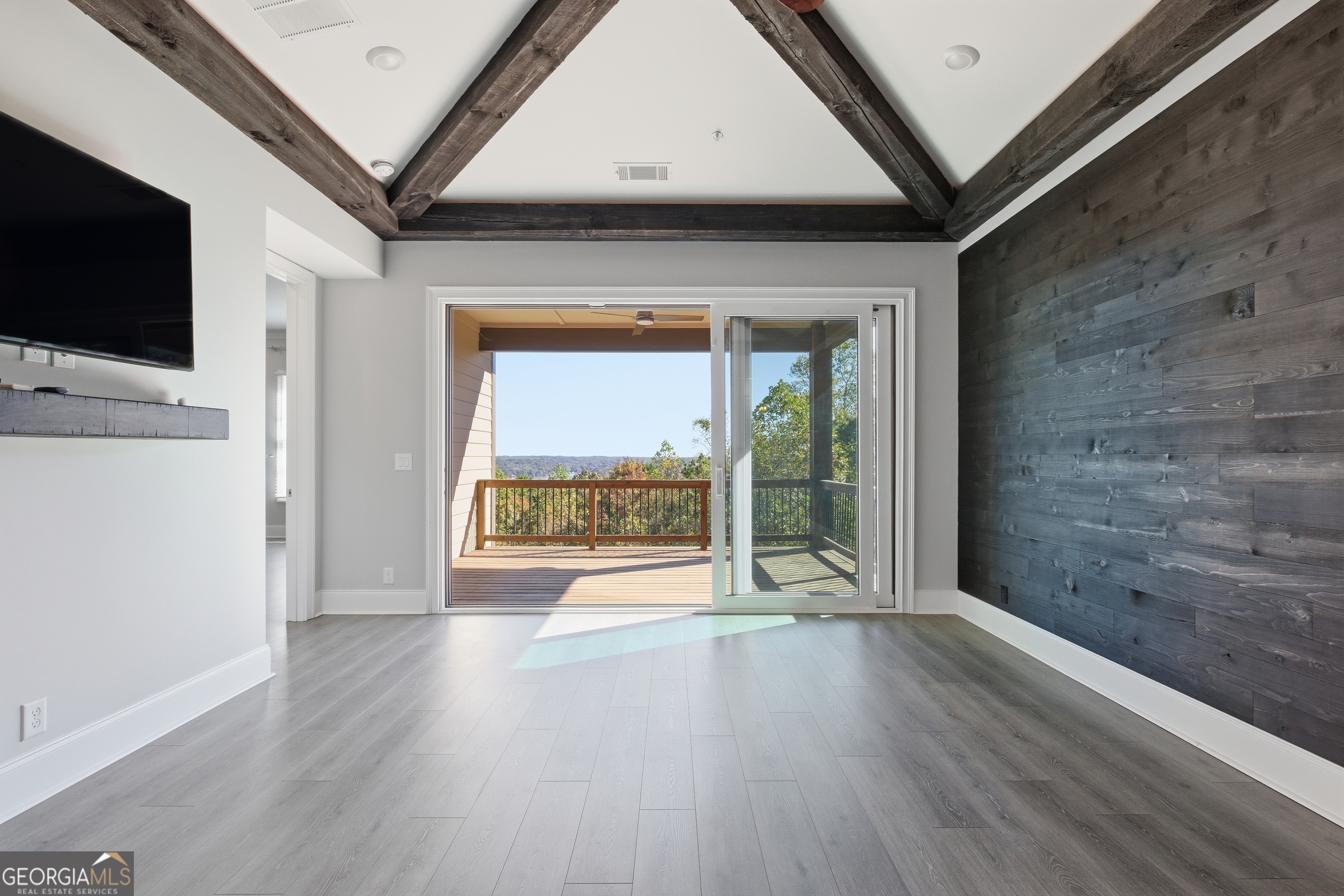 17 Cottage Lane, Unit 202 Toccoa, GA 30577 - Photo 26 of 43 a view of an empty room with a flat screen tv