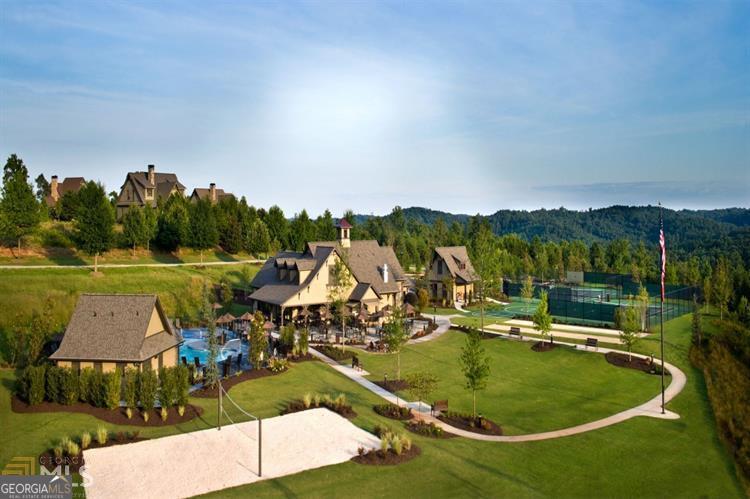 17 Cottage Lane, Unit 202 Toccoa, GA 30577 - Photo 39 of 43 an aerial view of a house with a garden and lake view